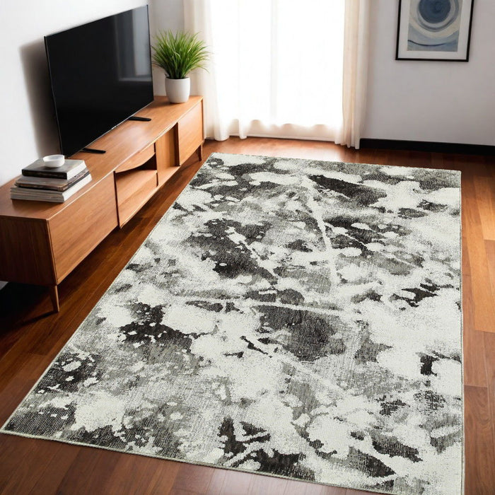 5' x 7' Abstract Power Loom Area Rug - Gray And White
