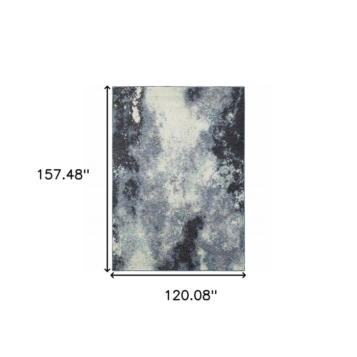 10' x 13.1' Abstract Power Loom Area Rug - Blue And Ivory