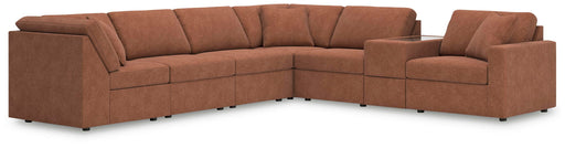 Modmax 7-piece stationary sectional sofa by Signature Design by Ashley® with plush cushions and modern design in a living room setting.
