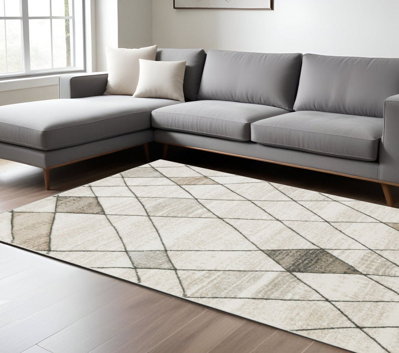 6' x 9' Geometric Power Loom Stain Resistant Area Rug - Beige Gray Tan And Brown