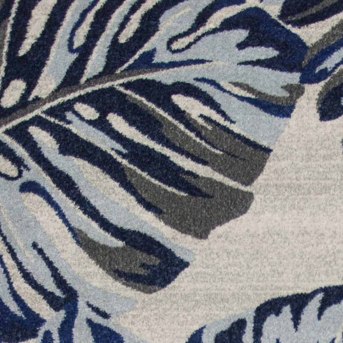 8' x 11' Machine Woven Oversized Tropical Leaves Indoor Area Rug - Gray Blue