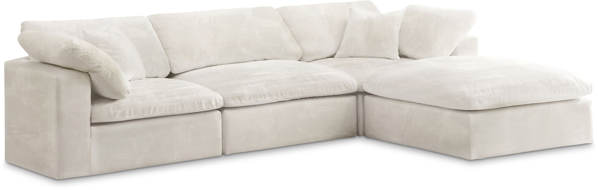 Cozy Meridian Furniture 4-piece modular sectional sofa with chaise, featuring plush cushions and modern design in a living room setting.