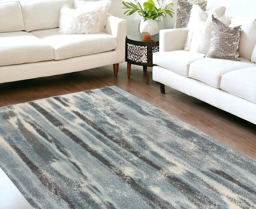 9' x 13' Polypropylene Area Rug - Teal