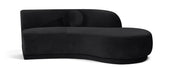 Meridian Furniture Avra 86-inch velvet upholstered sofa with plush cushions and sleek design in a stationary living room setup.