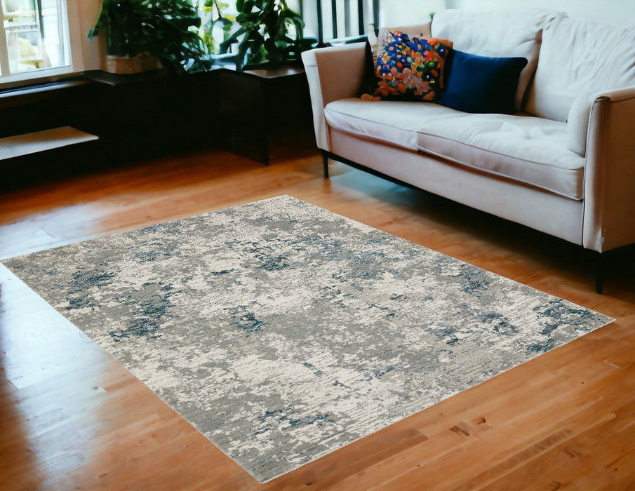 5' x 7' Abstract Power Loom Area Rug - Blue And Beige