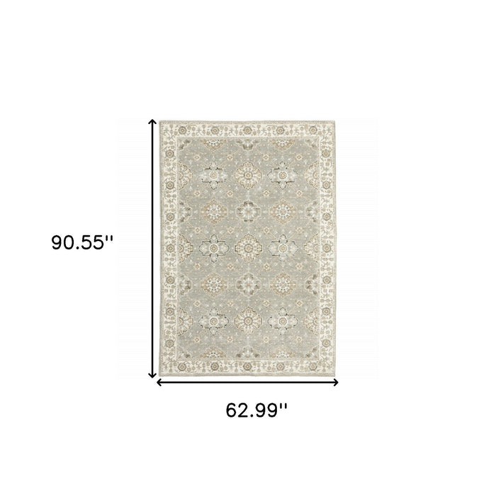5.3' x 7.6' Oriental Power Loom Area Rug - Gray And Ivory