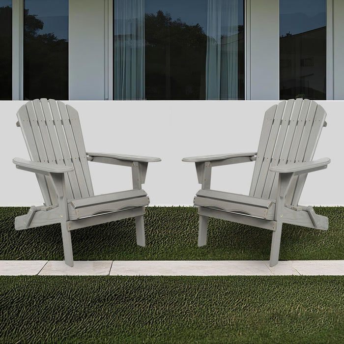 Set of two Giga outdoor wooden lounge patio chairs in solid cedar, folding Adirondack style for garden relaxation.