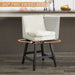 Set of two Giga cream white upholstered swivel bar stools with ergonomic design, featuring cushioned seats and modern style.