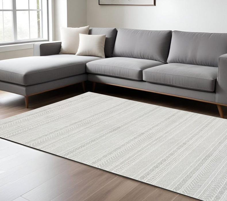 7' x 10' Geometric Power Loom Area Rug - Gray And White