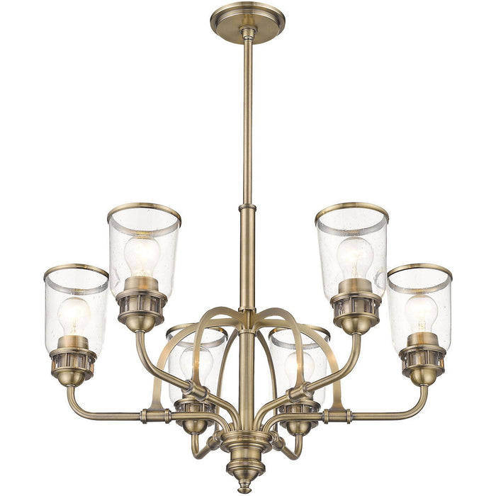 Six-light metal chandelier with shades in antiqued brass finish, featuring clear glass shades, by HomeRoots.