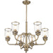 Six-light metal chandelier with shades in antiqued brass finish, featuring clear glass shades, by HomeRoots.