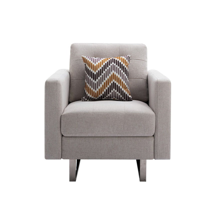Giga Victoria fabric armchair with metal legs, side pockets, and a matching pillow, showcasing a cozy, stylish seating option.