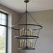 Black and gold metal chandelier with ten candle-style lights, dimmable HomeRoots chandelier for elegant lighting.