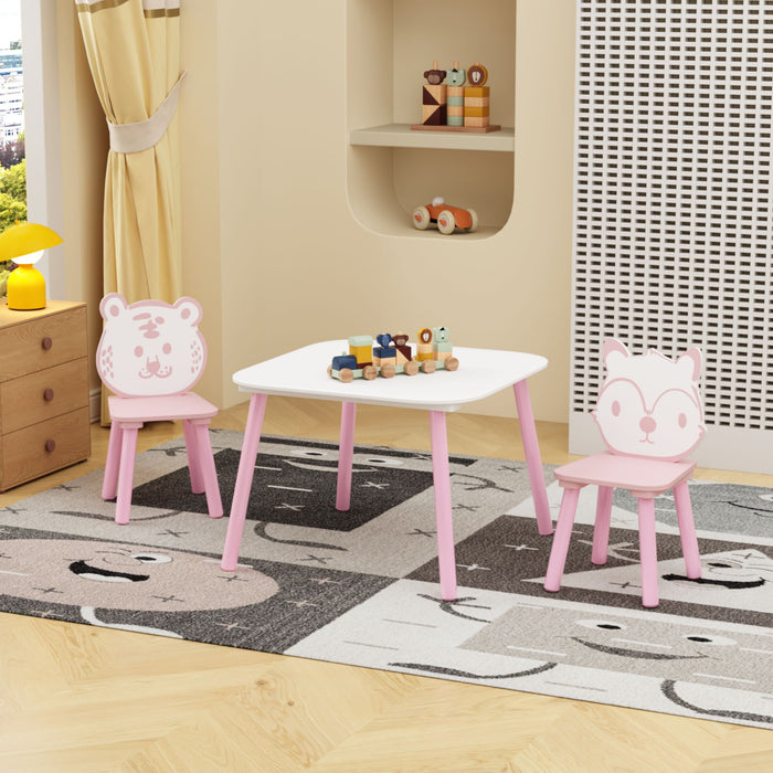 Pink and white wooden toddler table and chair set by Giga with animal backrest, suitable for young children.