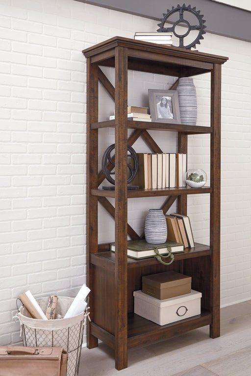 Rustic brown large bookcase from Signature Design by Ashley, featuring multiple shelves and a sturdy wooden frame.