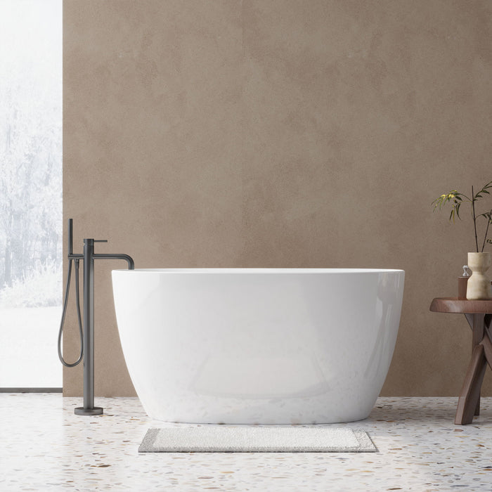 Giga freestanding oval bathtub with overflow, pop-up drain, double-walled design, glossy white finish, ideal for modern bathrooms.
