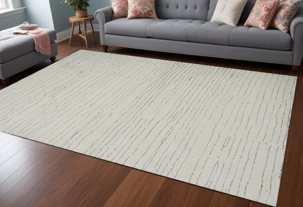 8' x 11' Abstract Power Loom Distressed Area Rug - Beige And Gray