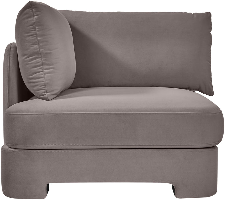 Velvet upholstered stationary chair by Meridian Furniture with a modern design, featuring plush fabric and sleek wooden legs.