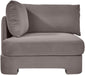 Velvet upholstered stationary chair by Meridian Furniture with a modern design, featuring plush fabric and sleek wooden legs.