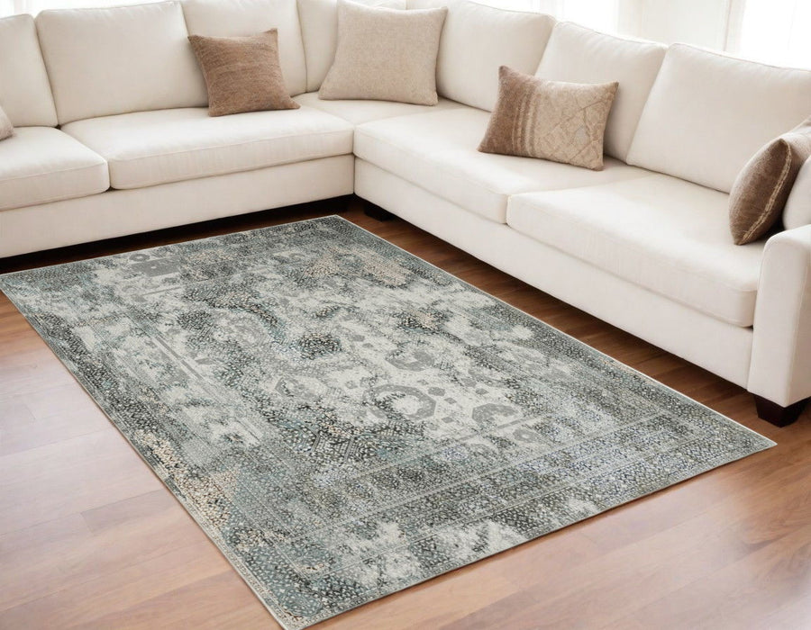 5' x 8' Oriental Power Loom Stain Resistant Area Rug - Ivory Gray Charcoal Blue And Rust