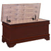 CoasterEssence Pablo cedar chest in warm brown wood finish, showing the sturdy wooden furniture with detailed craftsmanship.