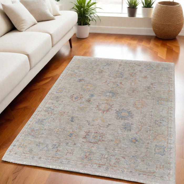 5' X 8' Floral Hand Woven Distressed Area Rug With Fringe - Tan