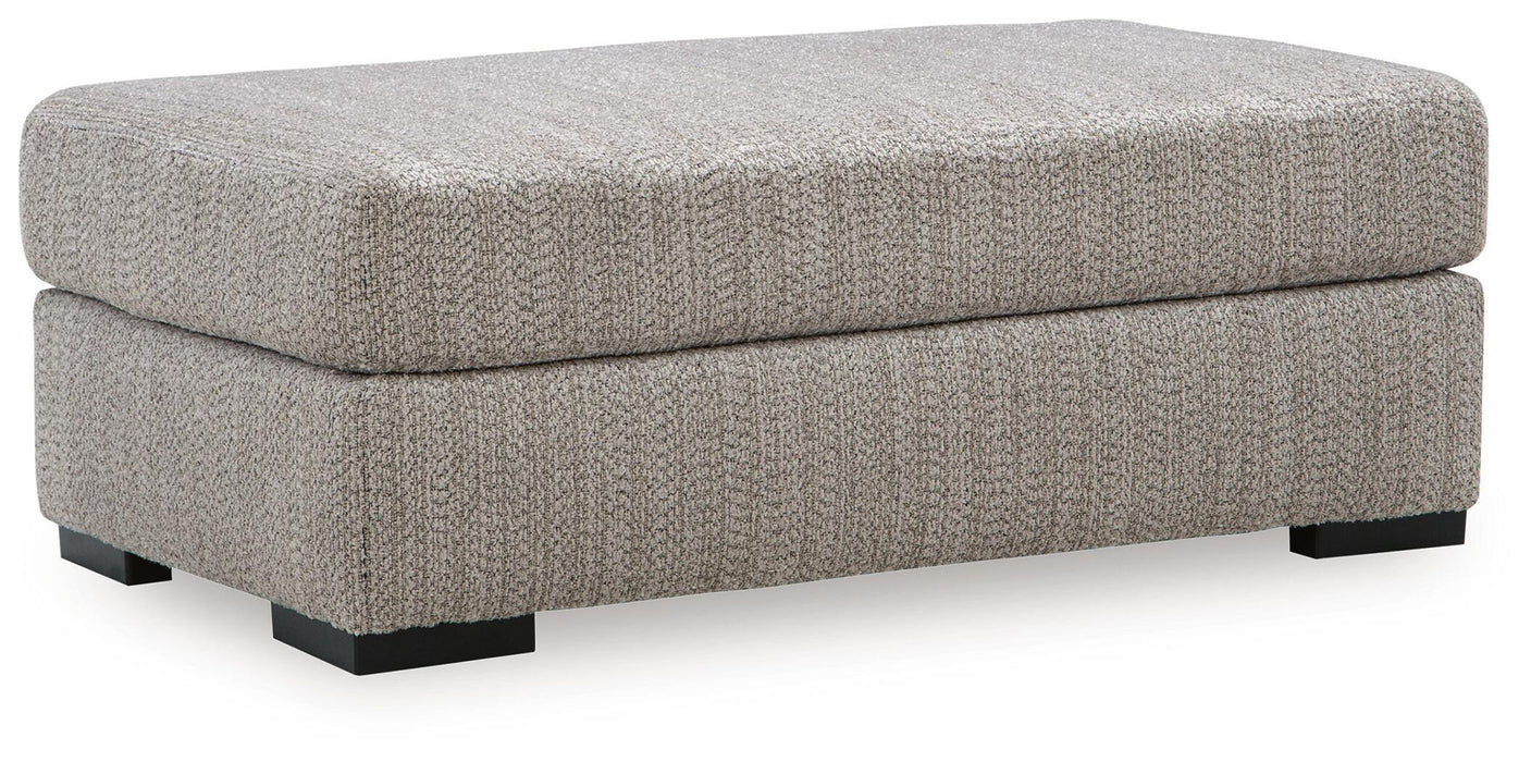 Signature Design by Ashley Lofwood upholstered ottoman with a soft fabric cover and sturdy wooden legs for versatile seating or footrest.
