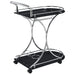 Black and chrome Elfman 2-tier glass shelf metal bar cart with wheels, modern furniture piece by CoasterEveryday.