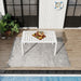 Modern Giga long dining table with UV-resistant white PP tabletop and rust-proof powder-coated metal legs, ideal for outdoor dining.