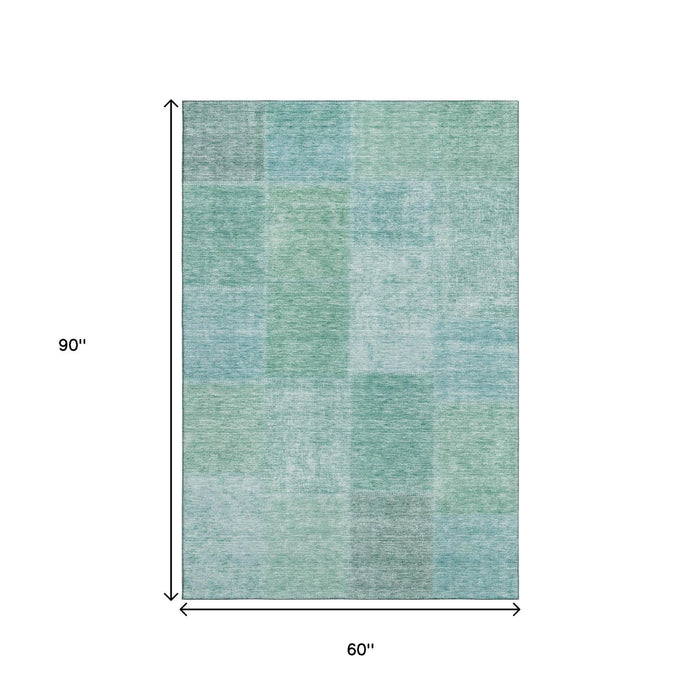 5' X 8' Patchwork Washable Area Rug With UV Protection (655236) - Teal / Ivory