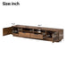Giga TV stand with deep drawers, cable management, and soft closing hinges, showcasing a modern entertainment center in a living room setting.