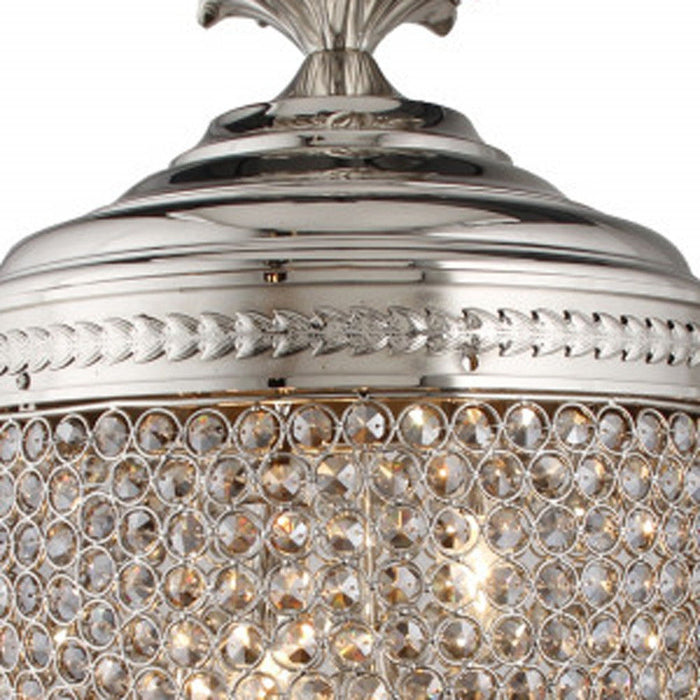 Three-light silver metal and crystal glass chandelier with shades from HomeRoots, showcasing elegant design and intricate details.