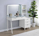 White high gloss Souza 5-drawer makeup vanity table with LED mirror, modern furniture by CoasterEveryday, image showing the sleek design.