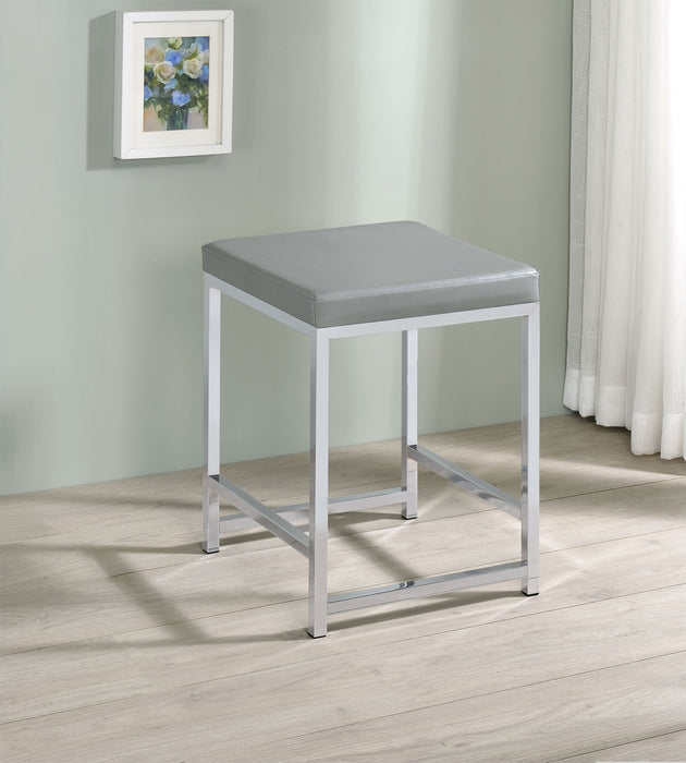 CoasterEssence Umbridge upholstered square padded cushion vanity stool in neutral fabric with sturdy legs