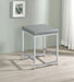 CoasterEssence Umbridge upholstered square padded cushion vanity stool in neutral fabric with sturdy legs