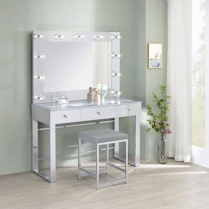 CoasterEssence Umbridge upholstered square padded cushion vanity stool in a soft neutral finish