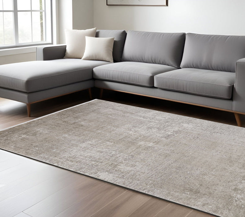 7' x 10' Abstract Power Loom Distressed Area Rug With Fringe - Tan Ivory And Gray
