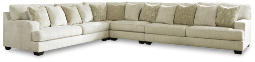 Rawcliffe Signature Design by Ashley left arm facing sectional sofa in parchment with plush cushions and modern design.