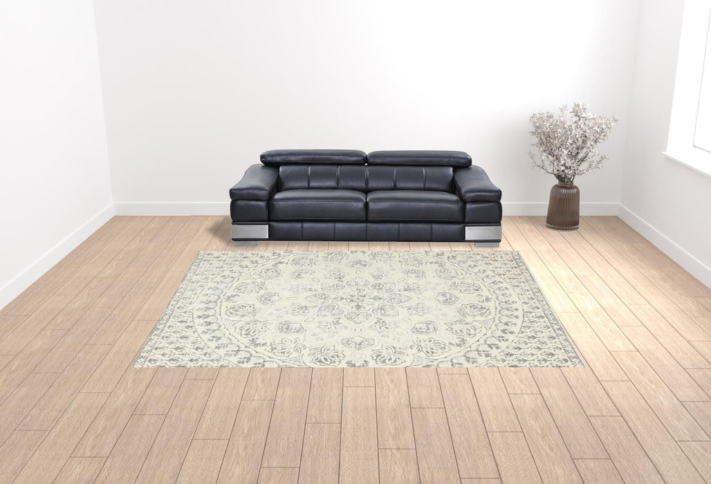 10' x 13' Floral Power Loom Stain Resistant Area Rug - Ivory And Gray
