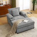 Giga modern oversized stationary chair with matching ottoman, cupholders, and built-in USB charging ports in a contemporary living space.