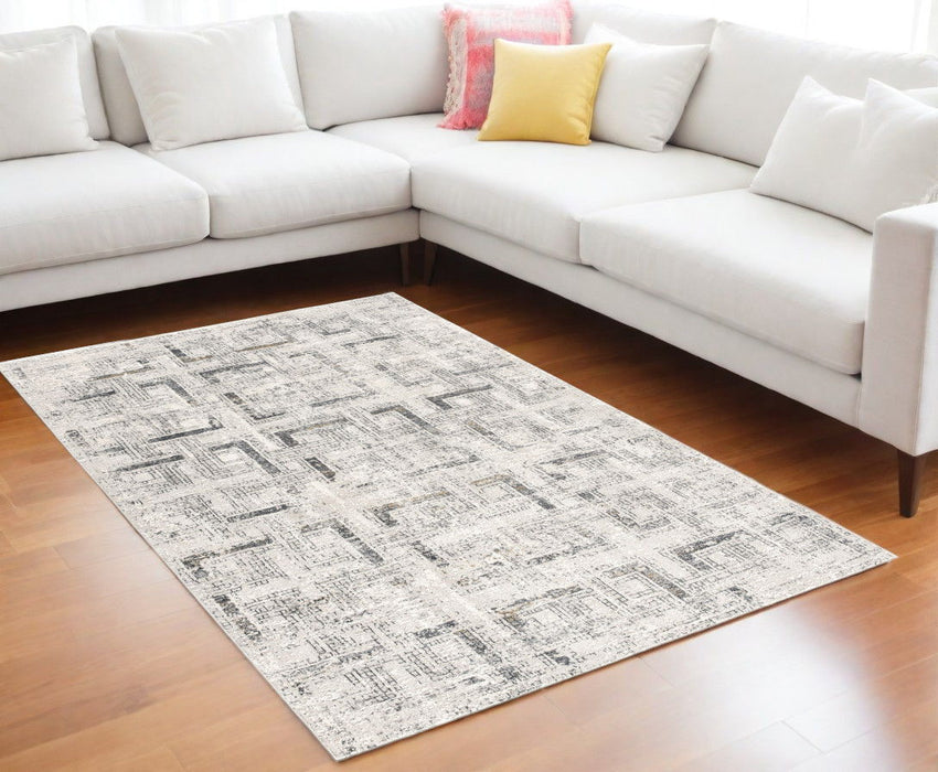 6.5' x 9.5' Abstract Power Loom Area Rug - Ivory And Gray