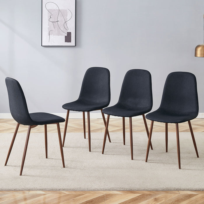 Set of four Giga luxury simple dining chairs with black linen cotton upholstery and metal-colored legs.