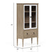 Sand-colored Bernards Furniture display bookcase with multiple shelves for displaying books and decorative items.