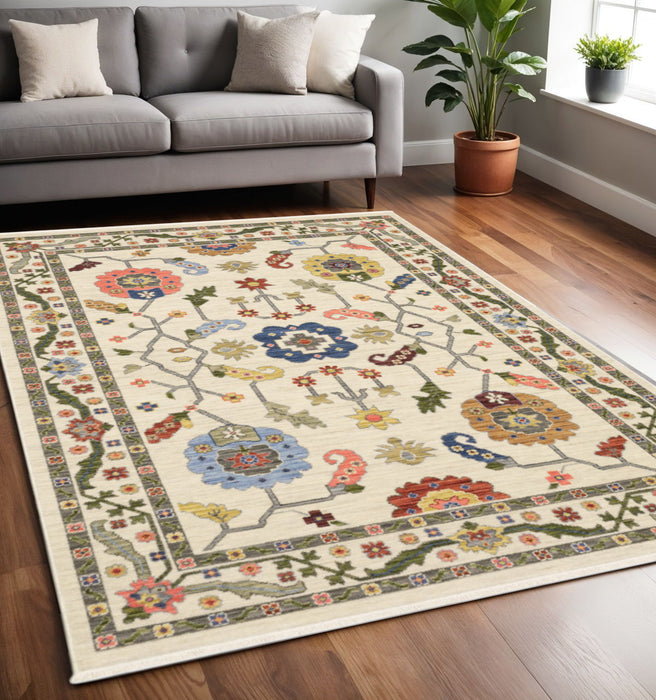 5' x 8' Oriental Power Loom Stain Resistant Area Rug With Fringe - Ivory Green Blues Pink Yellow Rust Brown Tan And Gray