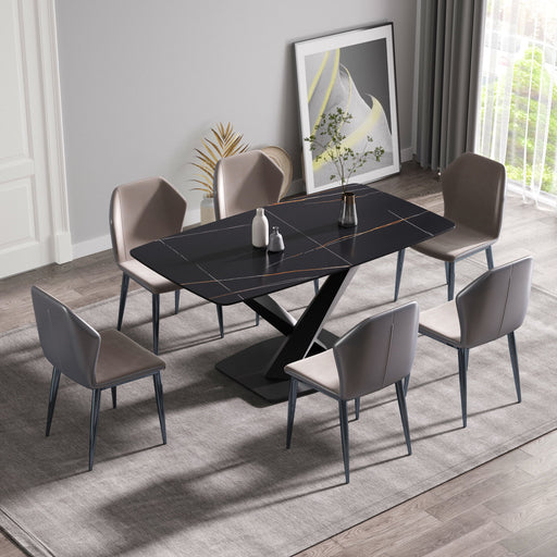 Giga 63-inch black artificial stone dining table with curved black metal legs, showcasing a modern and sleek design.
