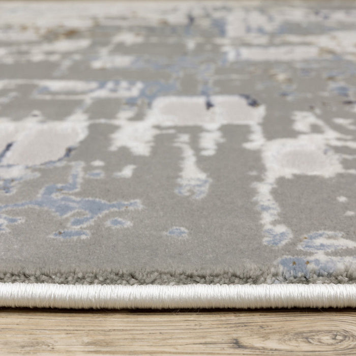 8' x 11' Abstract Power Loom Stain Resistant Area Rug - Gray Blue Brown Ivory And Deep Blue