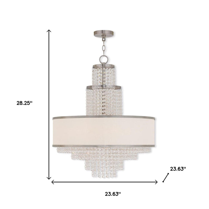 Six-light metal chandelier with off-white shades in nickel finish, featuring clear glass accents, designed for elegant home lighting.