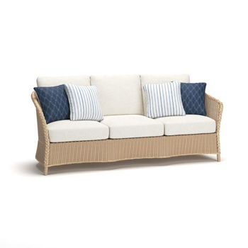 Signature Design by Ashley Stewarts Point beige sofa with cushions