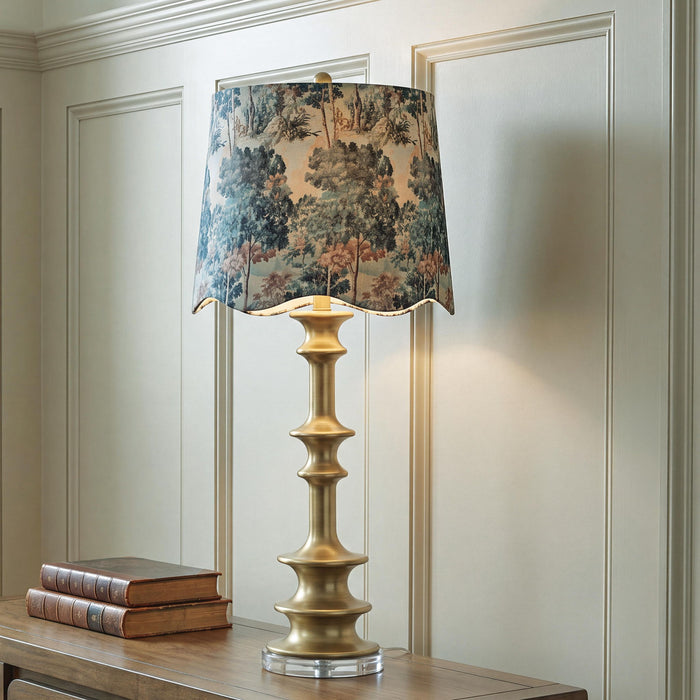 Signature Design by Ashley Poly Table Lamp in antique gold finish, with a sleek modern base and fabric lampshade.