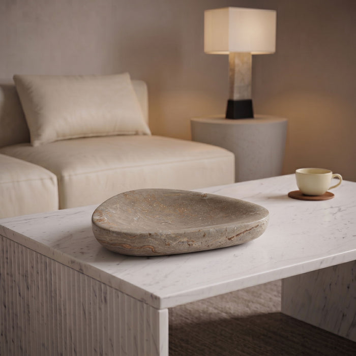 Meridian Furniture Whelan travertine bowl, a stylish ceramic plate with a textured beige finish, suitable for serving or decor.